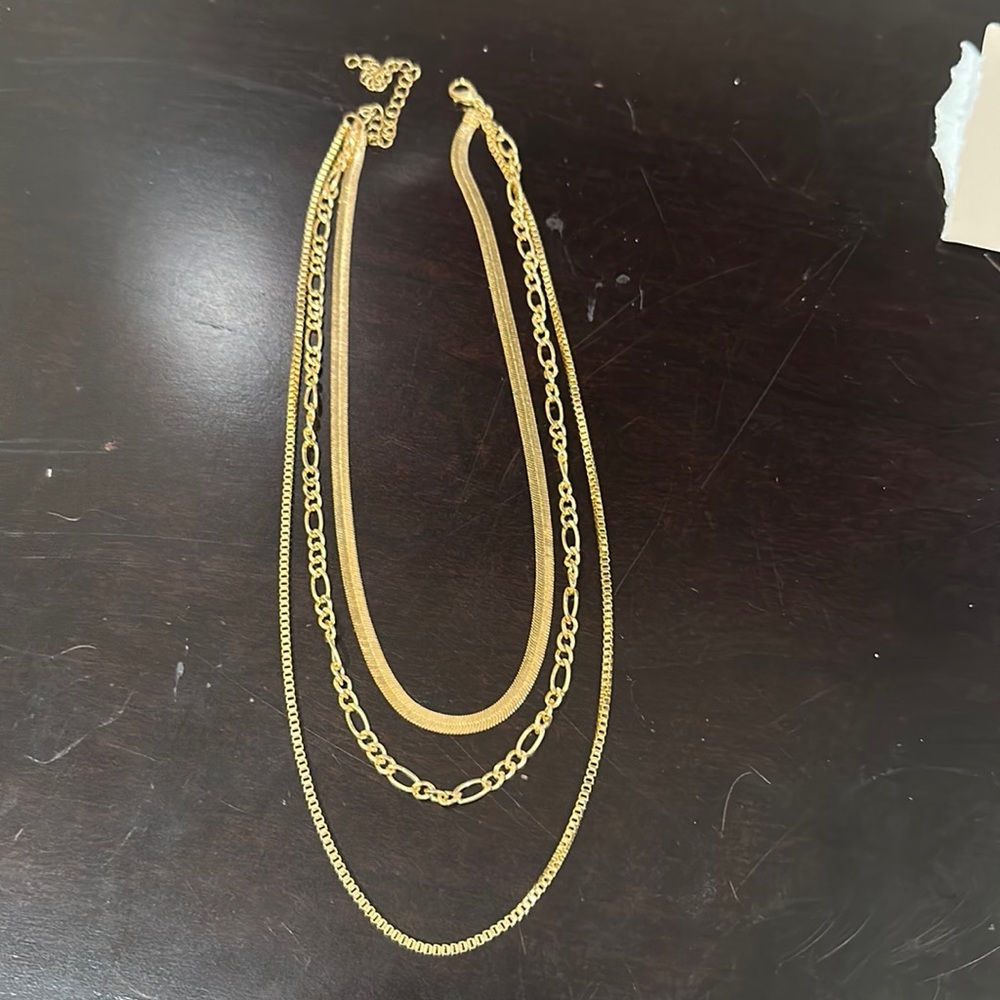 Gold three chain necklace